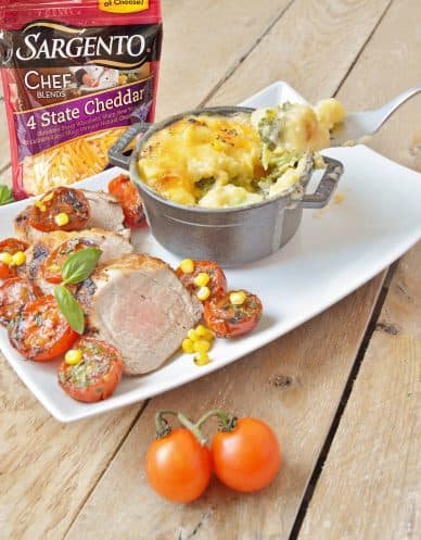 Roasted pork and tomatoes with a crusty broccoli and potatoes pie